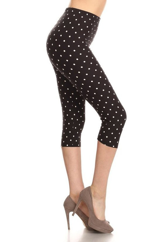 High Waisted Capri Leggings With An Elastic Band In A White Polka Dot Print Over A Black Background Smile Sparker